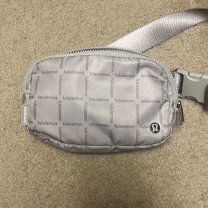 Lululemon belt bag word mark grid in raw linen color used